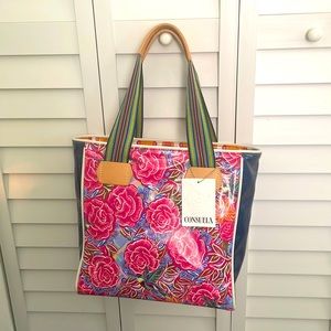 consuela tote NWT floral print with humming bird .. water proof material .